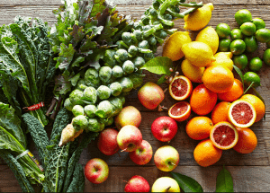 a group of fruits and vegetables on a wood surface Healthy Weight Loss Diets Abingdon