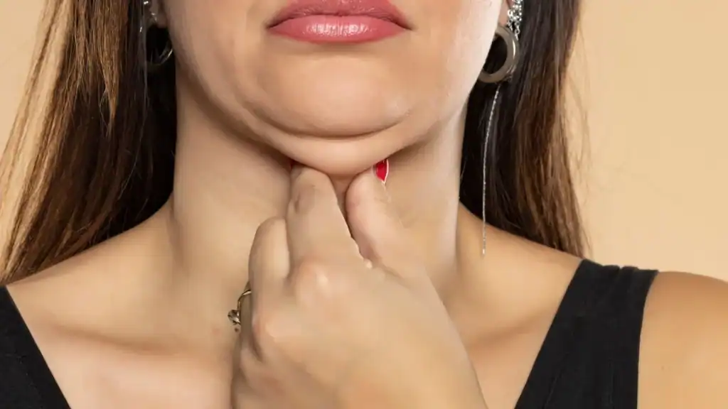 An image of a woman with double chin, sad, worried : Non Surgical Double Chin Removal Treatment in Abingdon, UK
